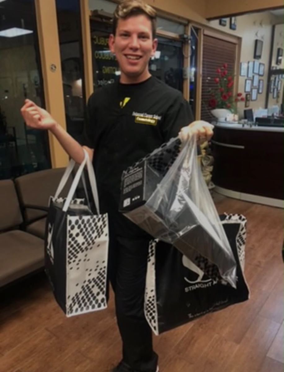 A student with his Straight Ahead tool bags