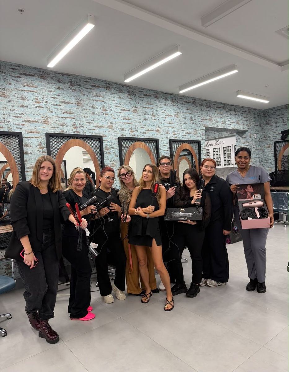 Stylists holding Straight Ahead tools